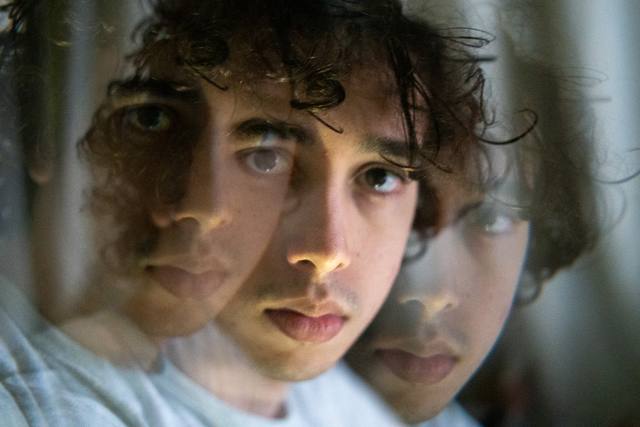 multi-face double-exposure portrait